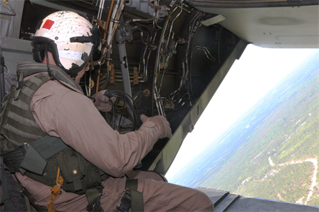 Sgt. Joshua L. Fairchild, a crew chief with Marine Medium Tiltrotor Training Squadron 204, stows gear during flight training, May 3. VMMT-204 is responsible for training all Marine MV-22B Osprey pilots and crew chiefs. During this flight, the instructors guided the students through multiple scenarios including aerial maneuvers and confined area landings.